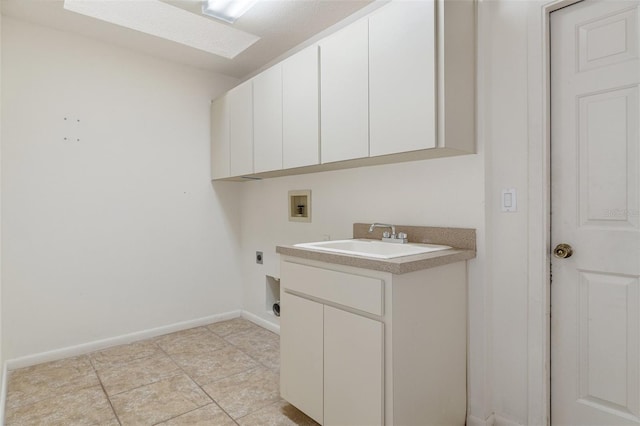 laundry area with cabinets, hookup for a washing machine, sink, and hookup for an electric dryer