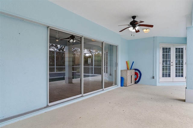 view of patio / terrace with ceiling fan and french doors