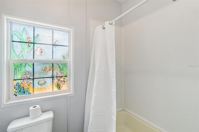 14904 Old Dixie Hwy, Hudson, FL 34667 - bathroom with toilet and a shower with shower curtain