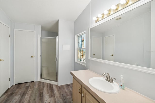 14904 Old Dixie Hwy, Hudson, FL 34667 - bathroom with a shower stall, wood finished floors, and vanity