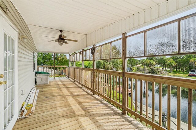 14904 Old Dixie Hwy, Hudson, FL 34667 - wooden terrace with a water view and ceiling fan
