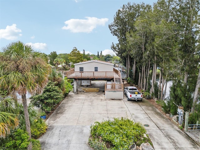 14904 Old Dixie Hwy, Hudson, FL 34667 - view of front of home with driveway and stairway