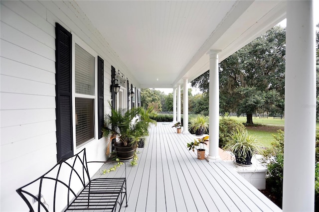 wooden terrace featuring a porch