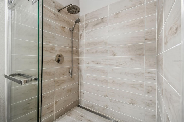 full bathroom with a shower stall