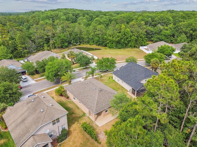 bird's eye view with a forest view