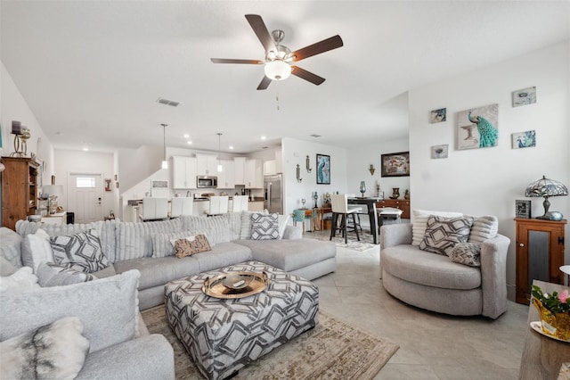 living room with ceiling fan