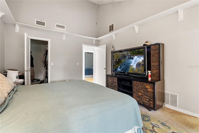 bedroom featuring visible vents and carpet floors