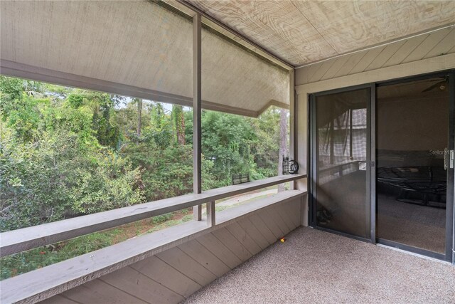 sunroom / solarium with wood ceiling