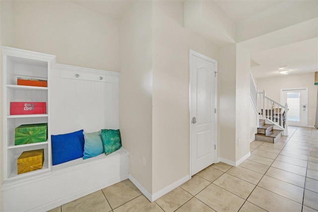 interior space with light tile patterned floors