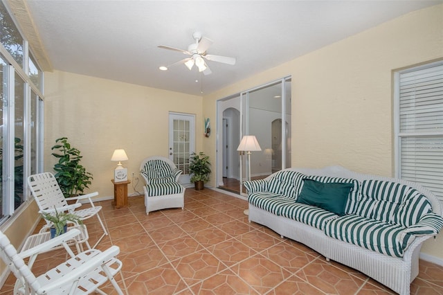 living room with ceiling fan