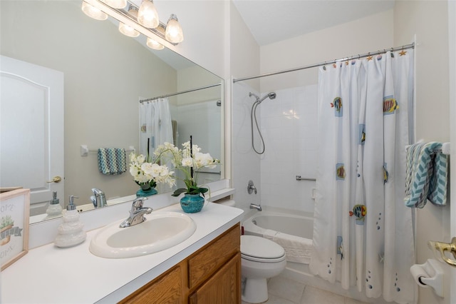 full bathroom featuring vanity, tile patterned floors, toilet, and shower / bath combo with shower curtain