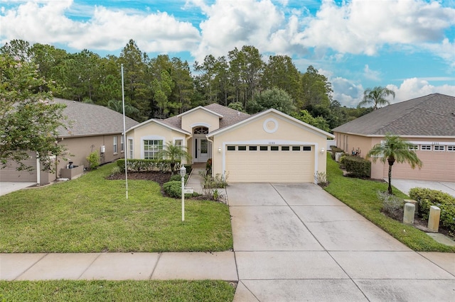 ranch-style house featuring stucco siding, driveway, a garage, and a front lawn