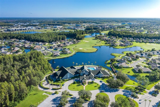 drone / aerial view with a residential view and a water view