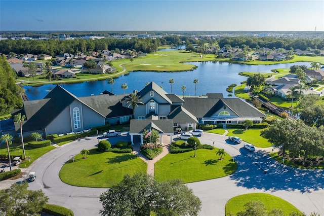 birds eye view of property featuring a residential view and a water view