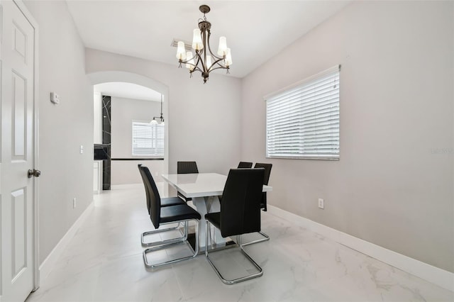 dining room featuring an inviting chandelier