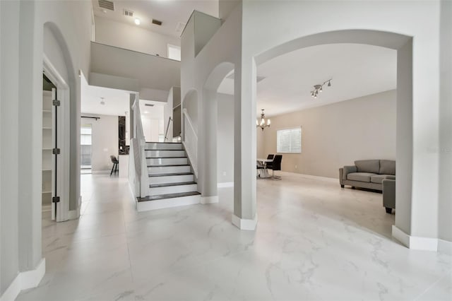 interior space with a notable chandelier