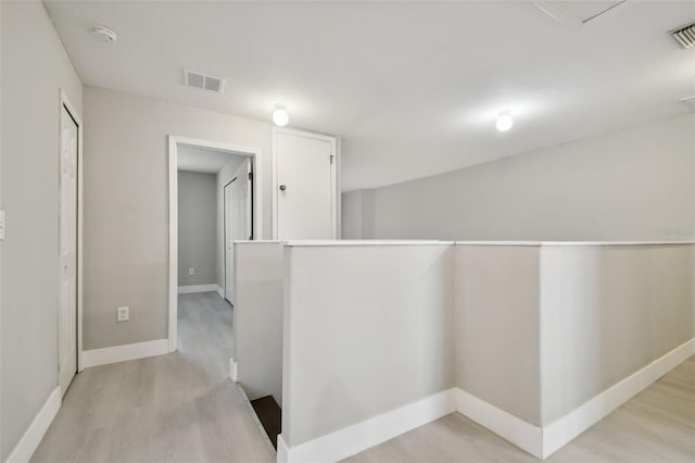 hall featuring light hardwood / wood-style flooring