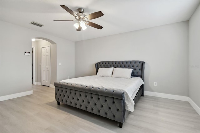 bedroom featuring ceiling fan and light hardwood / wood-style flooring