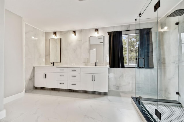 bathroom with an enclosed shower and vanity