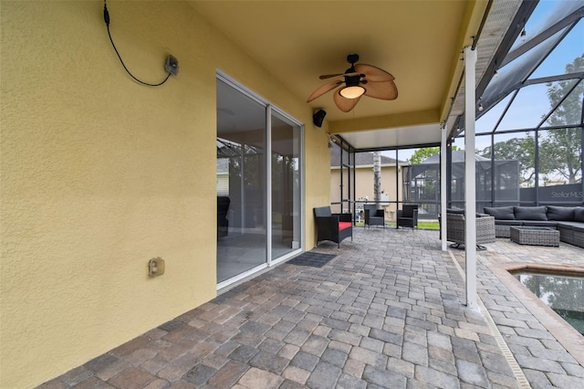 exterior space featuring ceiling fan