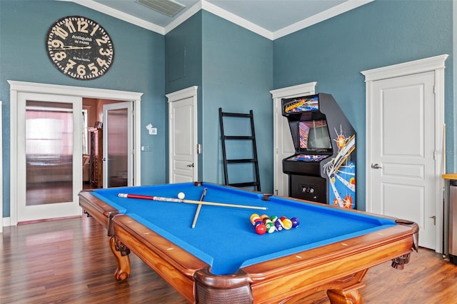 rec room with ornamental molding, billiards, and hardwood / wood-style flooring