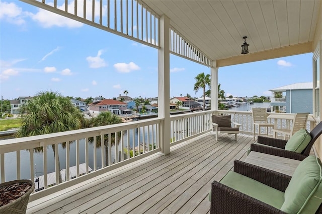 deck featuring a water view