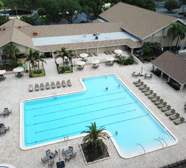 view of swimming pool featuring a patio