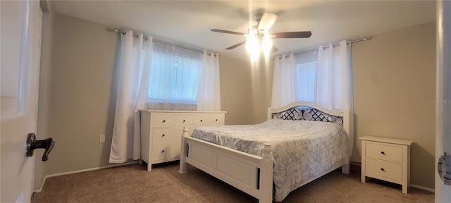 carpeted bedroom featuring ceiling fan