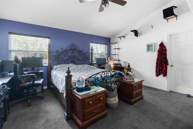 bedroom featuring dark carpet, ceiling fan, and vaulted ceiling