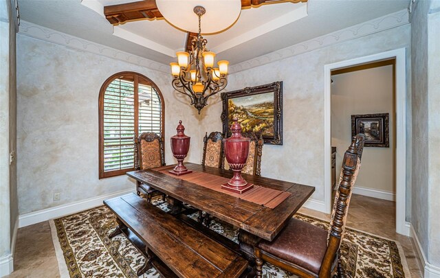 9943 Milano Dr, Trinity, FL 34655 - dining room with baseboards, an inviting chandelier, and a raised ceiling