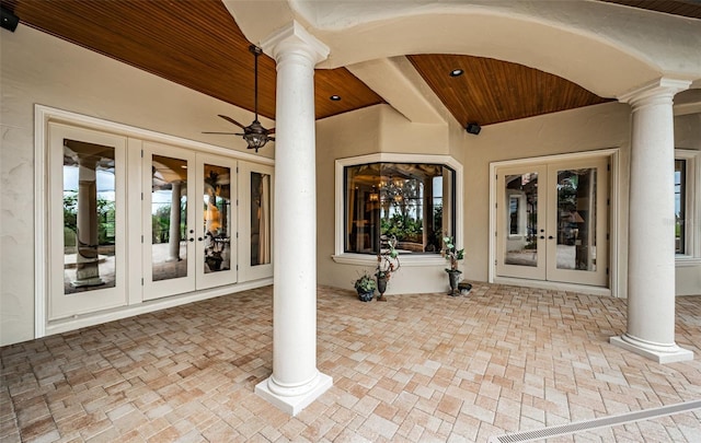 view of patio / terrace featuring ceiling fan and french doors