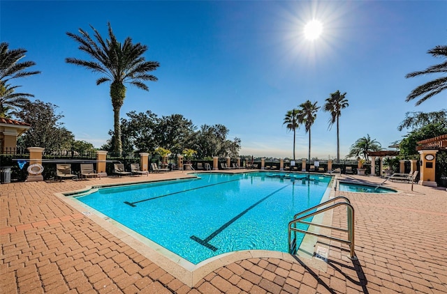 view of pool featuring a patio area