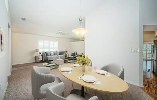 dining space featuring ceiling fan