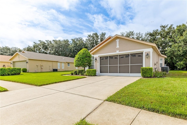 ranch-style house with a front lawn, a garage, and central AC unit