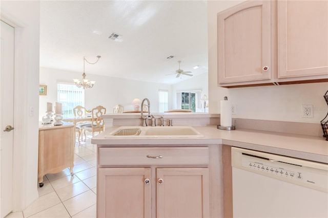 kitchen featuring dishwasher, ceiling fan with notable chandelier, a healthy amount of sunlight, and sink