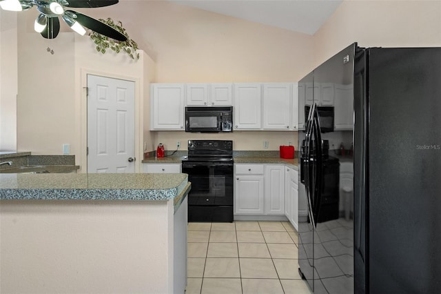 kitchen featuring black appliances, white cabinetry, ceiling fan, light tile patterned floors, and vaulted ceiling