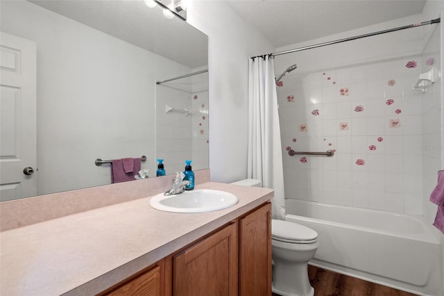 full bathroom with vanity, toilet, shower / bathtub combination with curtain, and hardwood / wood-style flooring