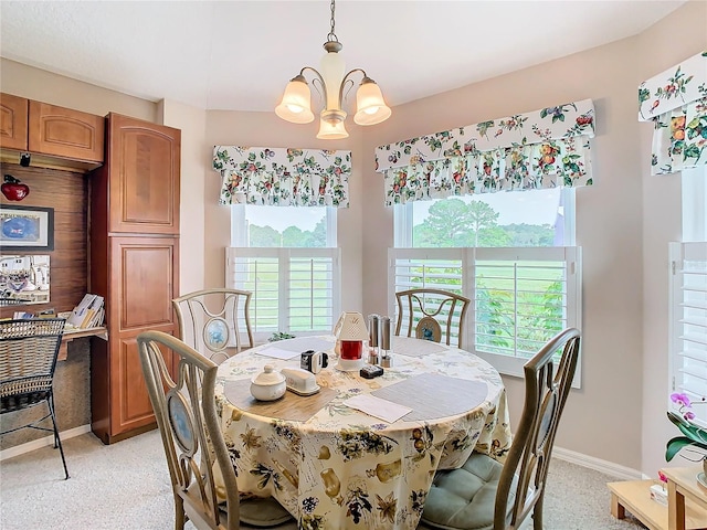 dining room featuring a notable chandelier