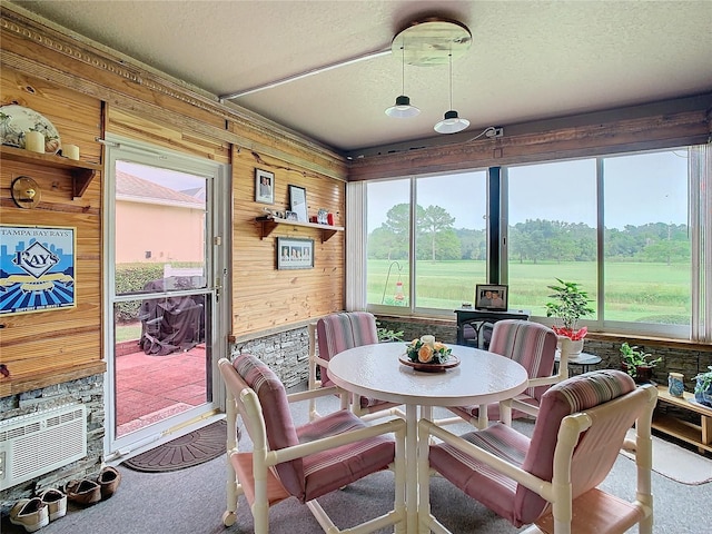 sunroom / solarium with a healthy amount of sunlight