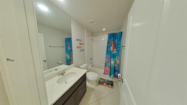 full bathroom with vanity, shower / tub combo, toilet, and tile patterned floors