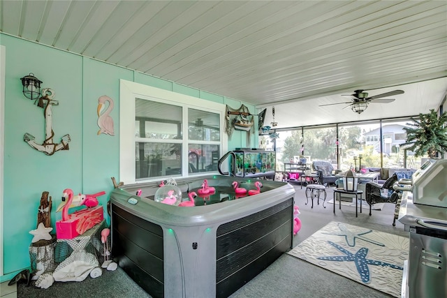 sunroom / solarium with ceiling fan