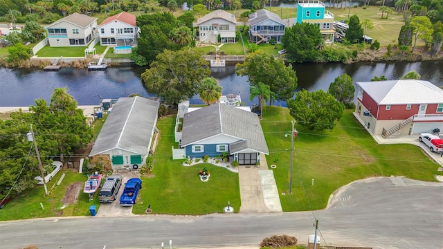 drone / aerial view featuring a water view