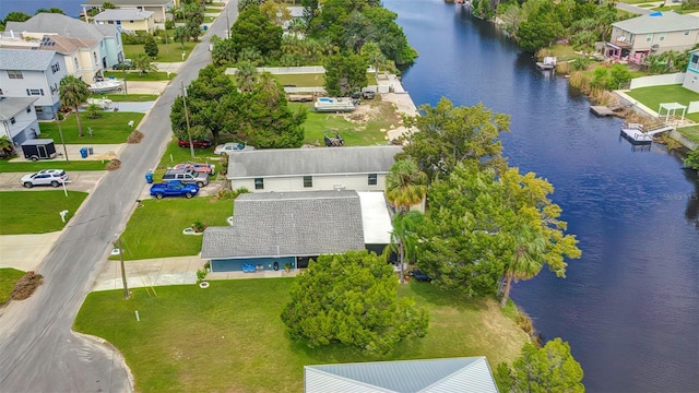 aerial view of residential area with a nearby body of water