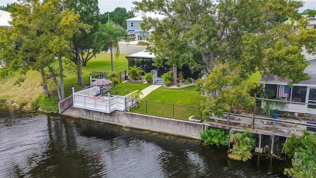 dock featuring a deck with water view
