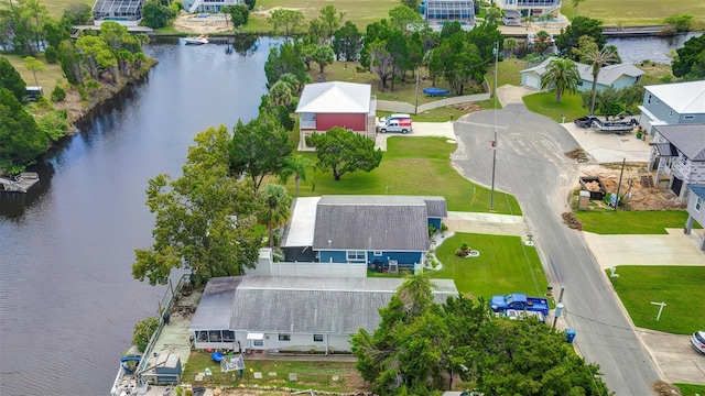 drone / aerial view with a water view