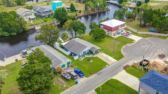 drone / aerial view featuring a water view