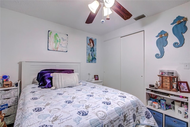 bedroom featuring a closet and ceiling fan