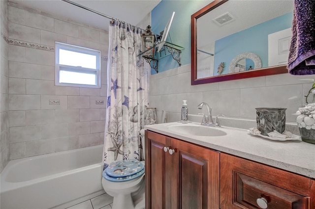 full bathroom featuring tile walls, shower / bath combination with curtain, backsplash, vanity, and toilet