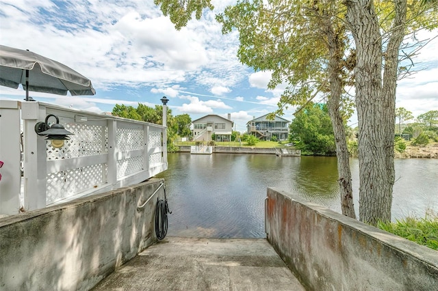 dock area featuring a water view