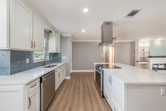 kitchen featuring white cabinets, light wood-type flooring, stainless steel appliances, sink, and island exhaust hood